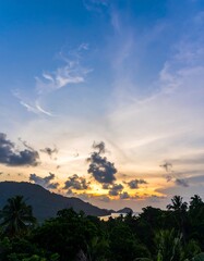 Scenic sunset over tropical mountains
