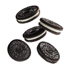 Five chocolate sandwich cookies with cream filling isolated on transparent background