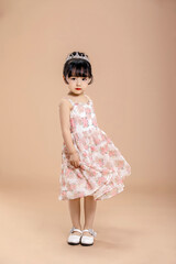 An Asian girl in a flowery dress