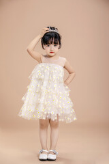 An Asian girl in a flowery dress