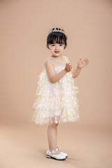 An Asian girl in a flowery dress