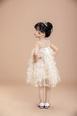 An Asian girl in a flowery dress