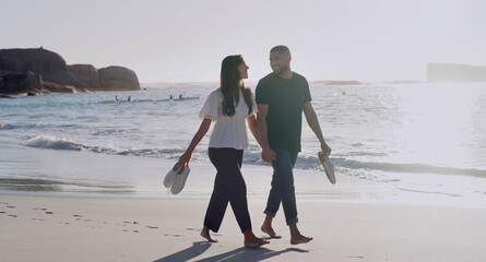 Love, holding hands and vacation with couple at beach for travel, summer and relax. Adventure,...