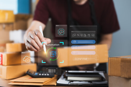 Online seller activating AI automation on tablet with logistics and barcode icons for smart order fulfillment and inventory management