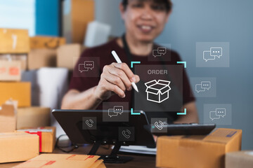 Online seller managing e-commerce orders with digital pen and tablet interface, featuring...