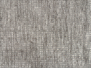 Close up of grey linen fabric, seamless background texture.