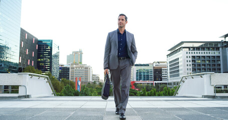 Mature business man, thinking and walking in city for property viewing, idea and planning outdoor....