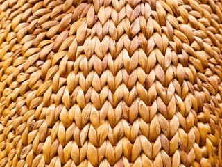 In the picture is the pattern and weaving of bamboo and light brown rattan. It is weaving for use...