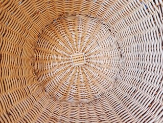 In the picture is the pattern and weaving of bamboo and light brown rattan. It is weaving for use...