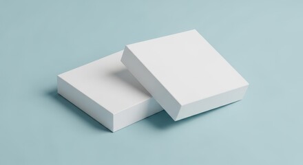 Two blank white boxes isolated on a light blue background