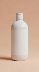 White cosmetic bottle with blank label on a peach background