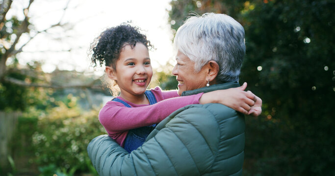 Hug, grandma and happy with child, outdoor or bonding with girl in nature, love or break on weekend. Park, old woman and kid with smile, embrace and together on holiday, granddaughter and family