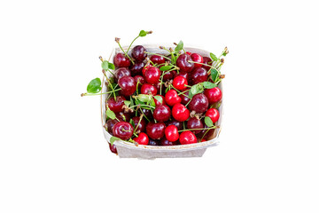 Fresh cheeries in a farmers market, isolated on a white background