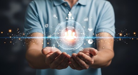 Person holding a glowing sphere with team icons and connected data points in their hands shown close up