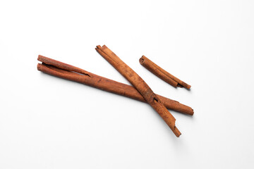 Cinnamon sticks isolated on white background, aromatic spice ingredient for cooking, baking, tea, and natural herbal health remedies.