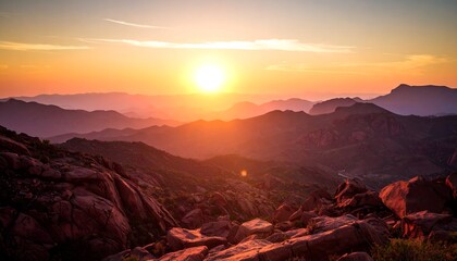 Sunset over mountainous landscape.