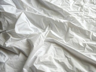 Close up of white crinkled fabric texture with shadows and highlights