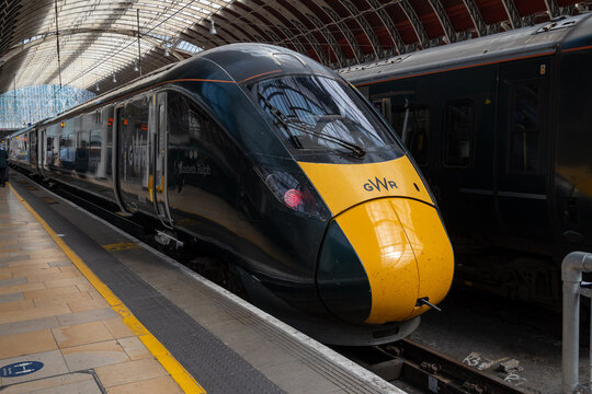 Modern British GWR (Great Western Railway) train standing at a platform