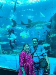 Couple tourist at Sentosa aquarium in Singapore