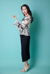 An Asian girl in fashionable clothes