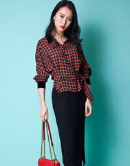 An Asian girl in fashionable clothes