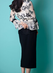 An Asian girl in fashionable clothes