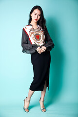 An Asian girl in fashionable clothes