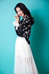 An Asian girl in fashionable clothes