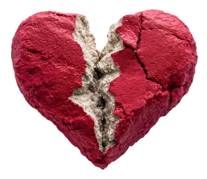 Cracked red heart shaped rock symbolizing emotional fragility and heartbreak