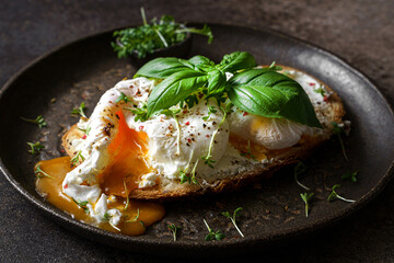 bruschetta with cottage cheese, poached egg and basil