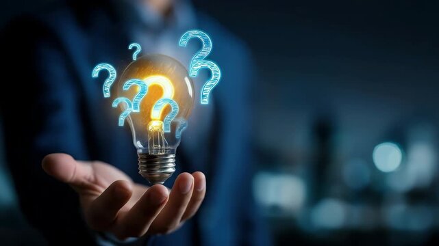 A glowing light bulb with question marks symbolizing idea, innovation, curiosity, creativity, business solution, problem solving, and thinking in technology context