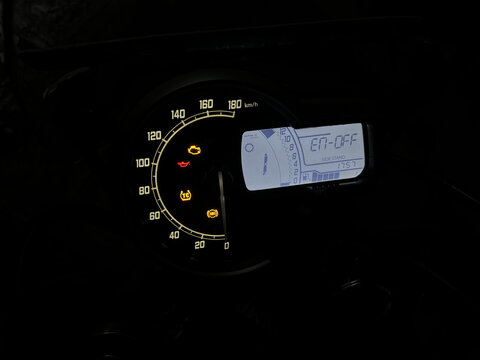 Close up of a speedometer isolated on black