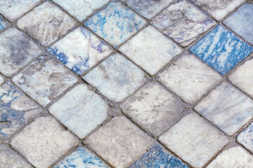 Close-up of ancient marble floor with diagonal square pattern in Laodicea, Turkey