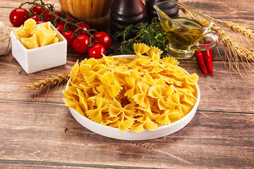Raw dry Italian pasta - farfalle