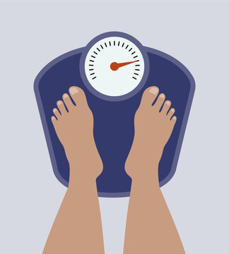 Standing on bathroom scale, measuring body weight.