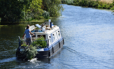 Narrowboat  - Canal Boat on the river Ouse at Houghton Cambridgeshire 