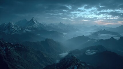 Misty, ethereal mountain range at dawn