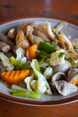 Indonesian Traditional Food, captured on August 19, 2025. Variety of local dishes including steamed rice, spicy sambal, fried tempeh, grilled chicken, vegetables, and authentic side condiments