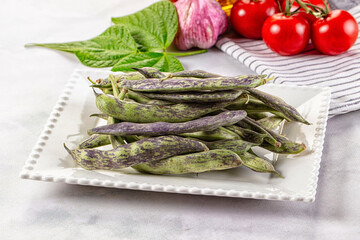 Raw green bean strips heap