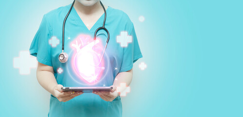 Doctor with tablet showing glowing heart illustration