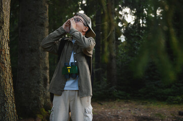 Lost boy scout shouting for help in forest