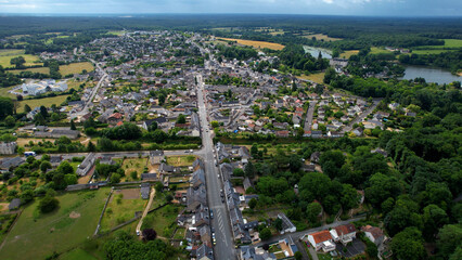 Aerial view around the old town of the city Seiches-sur-le in France on a sunny summer morning