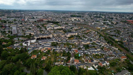 Aerial view around the old town of the city Le Mans in France on a cloudy summer morning
