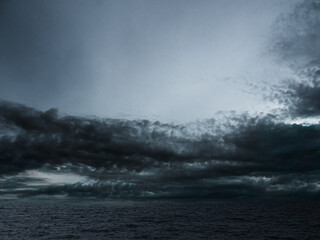 Cloud storm sky dark rain lightning thunder on sea ocean stormy typhoon nature light scene rainy...