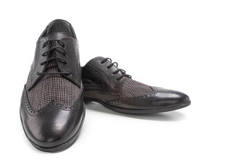 Pair of Stylish Classic Formal Male Black Polished Derby Leather Laced Shoes Placed Together Over White.