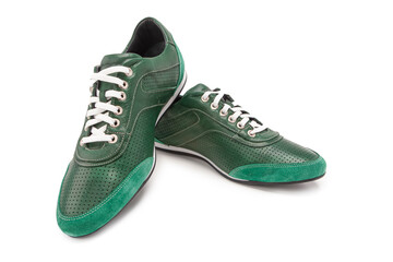 One Pair of Stylish Classic Sportive Male Stylish Green Suede and Calf Leather Laced Shoes Placed Together On One Another Over White.