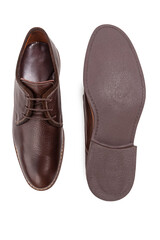 Footwear Concepts. One Pair of Stylish Classic Formal Male Brown Calf Leather Derby Laced Shoes Placed Together Over White.