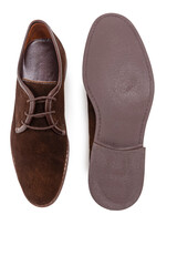 Mens Footwear Concepts. One Pair of Stylish Classic Formal Male Dark Brown Suede Chukka Boots Shoes Placed Together