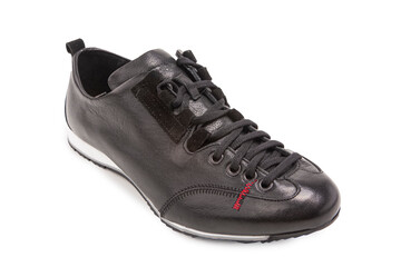 Footwear Ideas. One Stylish Sportive Male Black Leather Laced Derby Sneaker Shoe Placed Over Pure White.