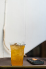 Refreshing peach iced tea in a glass, alcohol-free drink